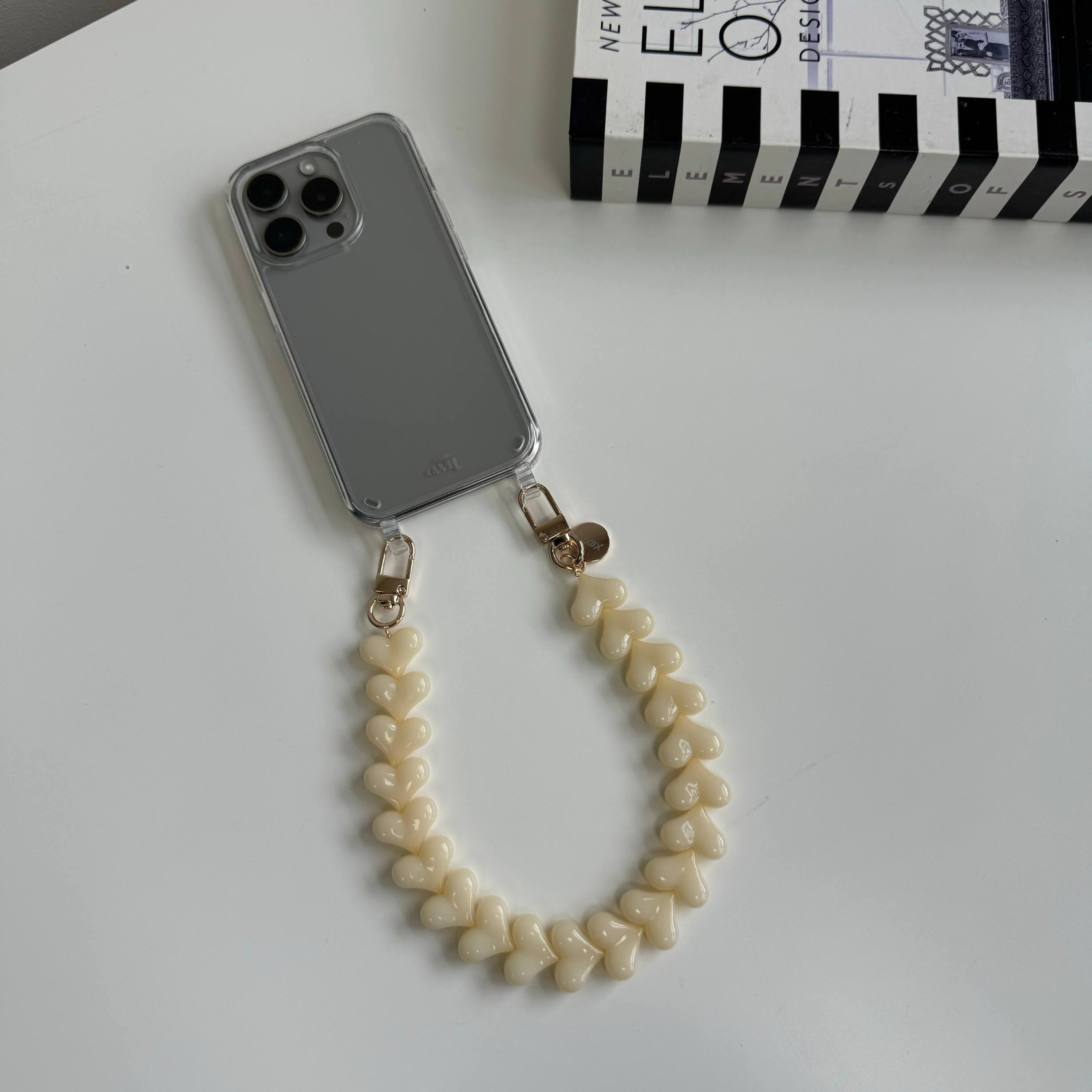 xoxo Wildhearts iPhone 17 Pro Max - Funky Hearts (Creme) Transparant Cord Case