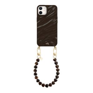 iPhone 11 Glaze Cord Case in Sweetheart Brown with a short heart-beaded wrist strap.