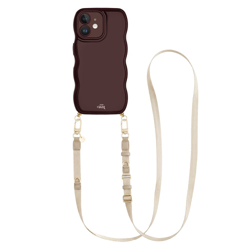 Glossy burgundy wavy iPhone 12 case with a beige adjustable lanyard strap and gold hardware.