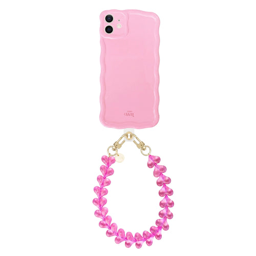 Glossy wavy bubble blush iPhone 11 case with a pink funky hearts cord and gold clasps.