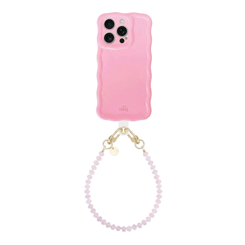 Glossy wavy bubble blush iPhone 13 Pro case with a short dusty pink beaded wrist cord.