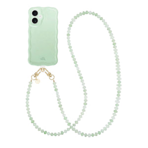 Glossy wavy sage green iPhone case with a long, beaded dusty green cord and gold clasps.