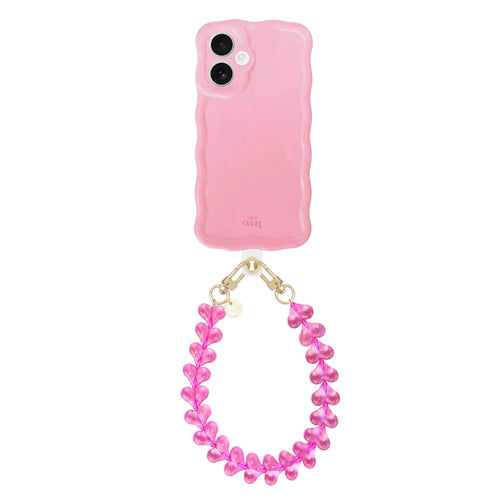 Glossy wavy light pink iPhone 16 case with a detachable Funky Hearts cord, featuring clear pink heart beads.