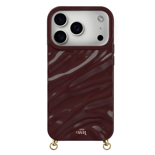 Burgundy Glaze Cord Case for iPhone with wavy texture, gold hardware, and "Xoxo GWH" branding.