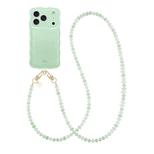 Glossy Wavy iPhone 17 Pro case in Sage Sorbet with a long, beaded Dusty Green cord.