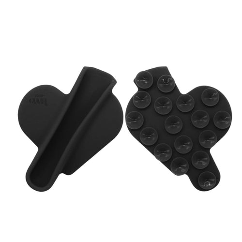 Zwarte hartvormige siliconen lipgloss houder met zuignappen.
