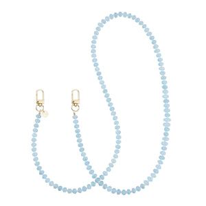 Lange Dusty Blue telefoonkoord van kralen met gouden haakjes en een parel detail.