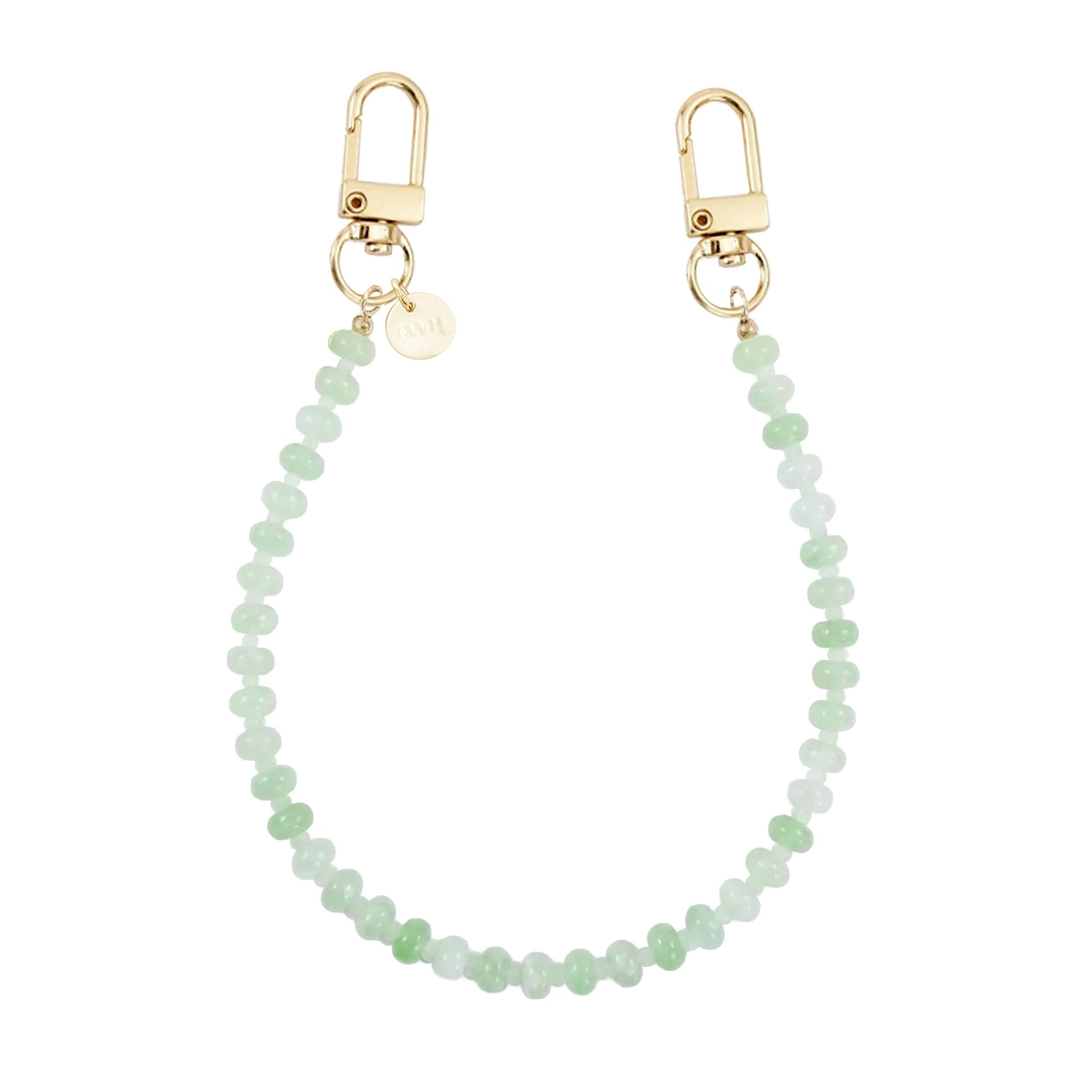 Kort Dusty Green kralenkoord voor telefoon met gouden karabijnhaken en merklabel.