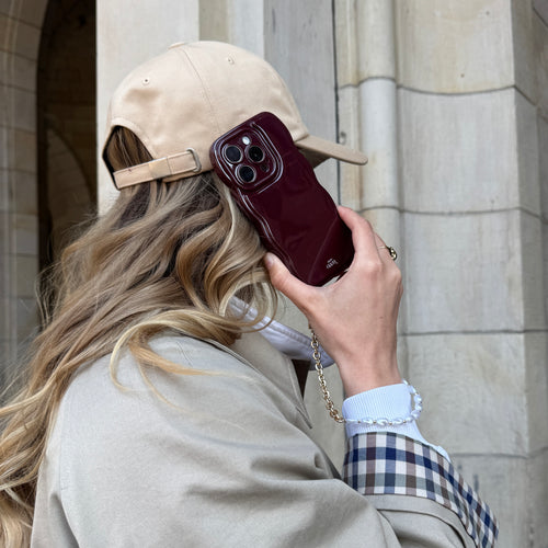 xoxo Wildhearts Glossy Wavy Cord Case Burgundy - Over The Moon (short) - iPhone 16 Pro Max