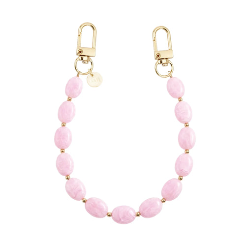 Kort Ocean Blush polskoord met roze marmeren kralen, gouden details en twee gouden sluitingen.
