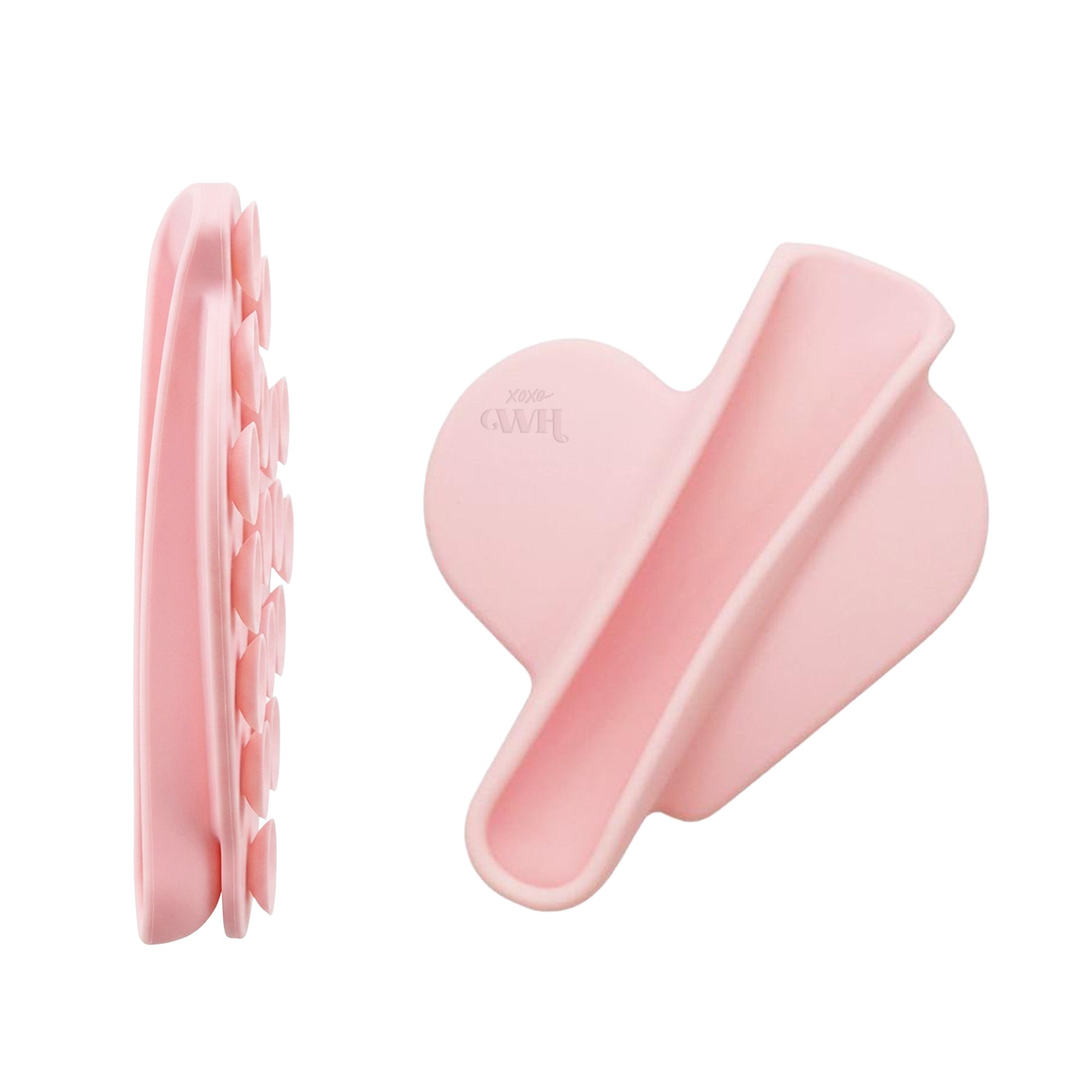 Roze hartvormige siliconen lipgloss houder met zuignappen, xoxo Wildhearts logo.