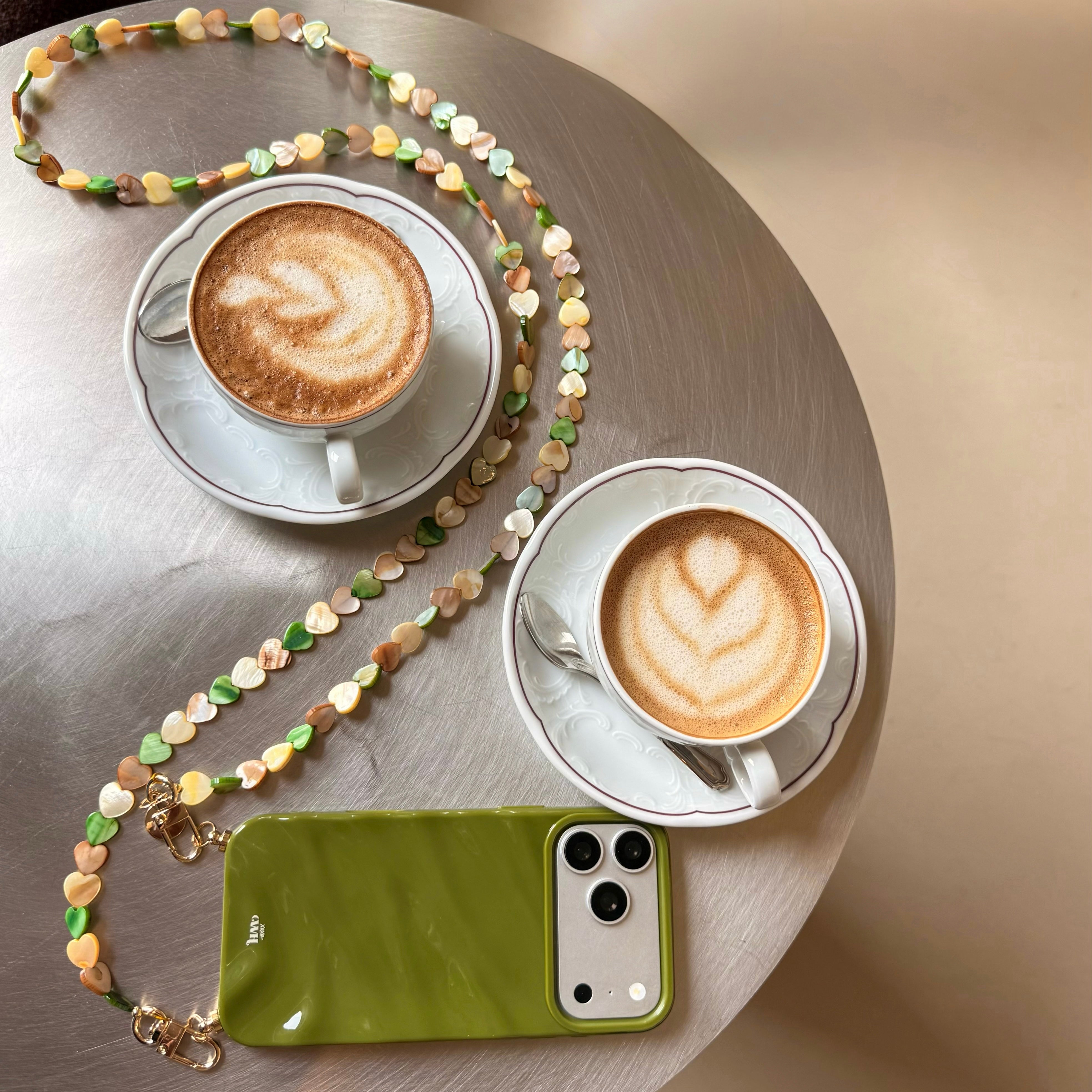 Green Glaze Cord Case - Shell Hearts Olives (long) - iPhone 16